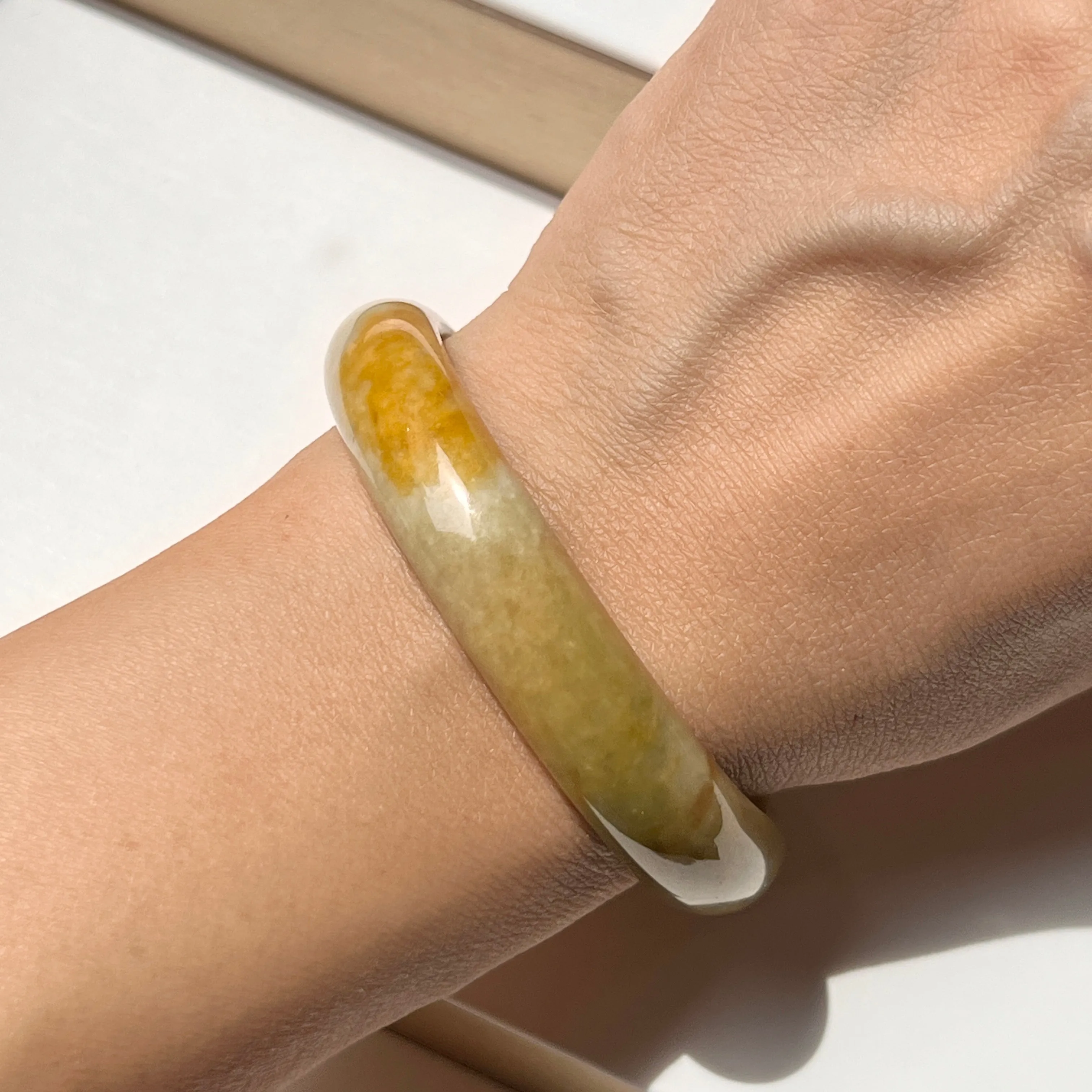 53.5mm A-Grade Natural Russet Jadeite Modern Oval Bangle No. 152012