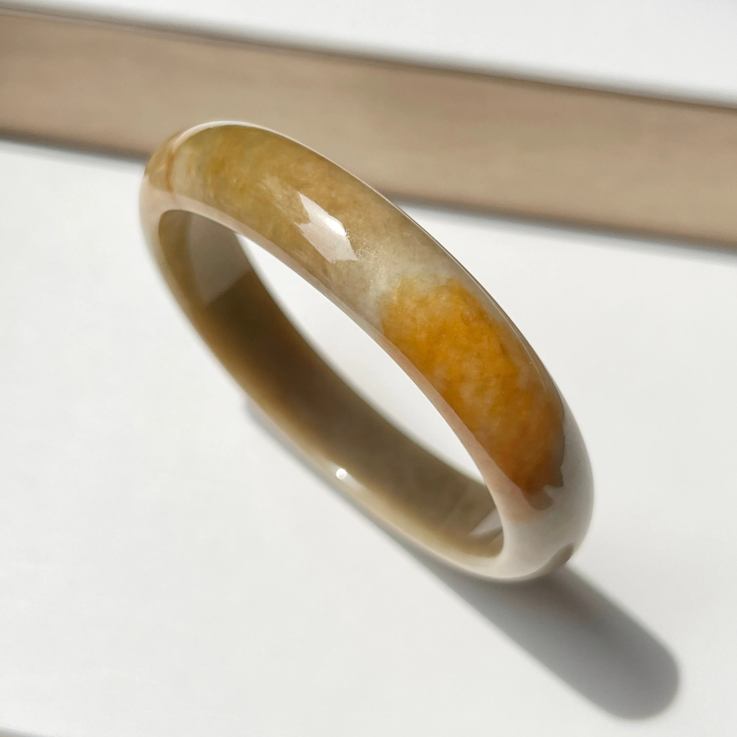 53.5mm A-Grade Natural Russet Jadeite Modern Oval Bangle No. 152012